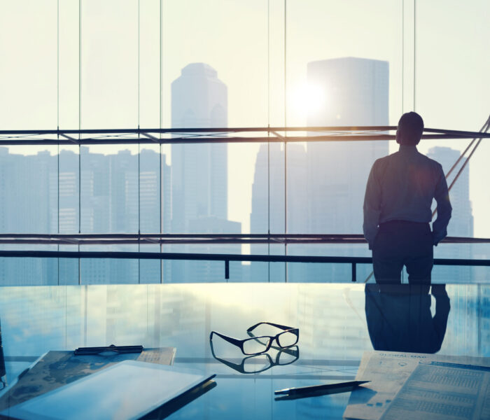 Businessman in a big office